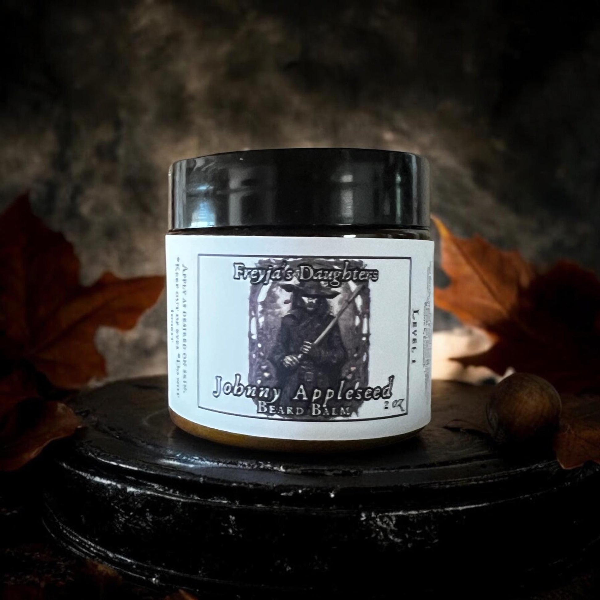 a beard balm that is sitting on a table