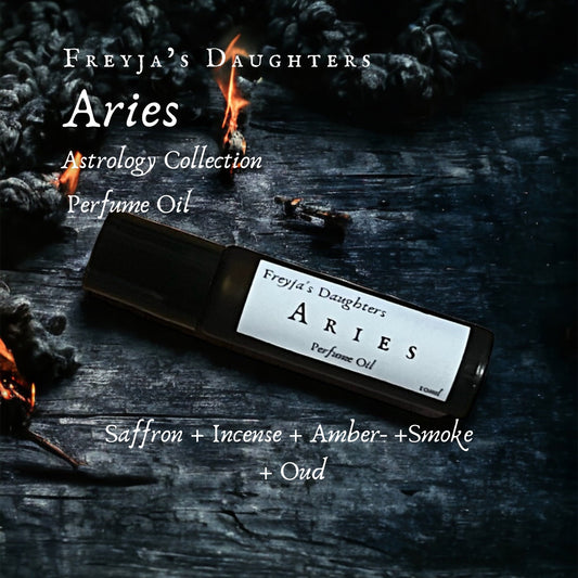 a bottle of aries perfume sitting on top of a wooden table