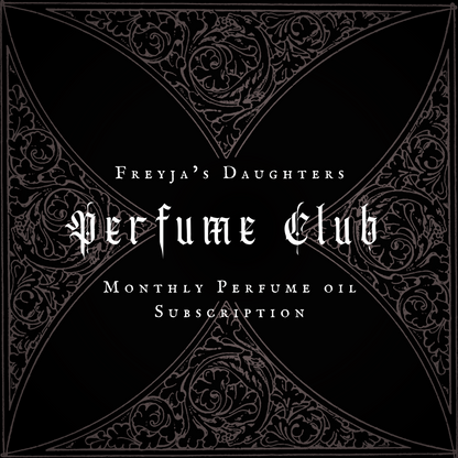 a black and white picture with the words perfume club